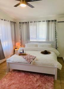 En eller flere senge i et værelse på Tropical Studio Boutique - Cerca de Gozalandia