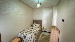 Ένα ή περισσότερα κρεβάτια σε δωμάτιο στο Stay here in fez