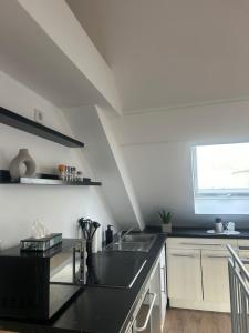Η κουζίνα ή μικρή κουζίνα στο Apartment in Wiesbaden +4 φωτογραφίες