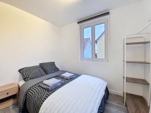 Un pat sau paturi într-o cameră la Illkirch-issime - Neuf - Tram - Proche centre-ville - Moderne