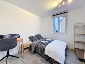 Un pat sau paturi într-o cameră la Illkirch-issime - Neuf - Tram - Proche centre-ville - Moderne