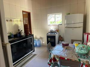 Η κουζίνα ή μικρή κουζίνα στο Sitio do Piquira