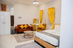 Giường trong phòng chung tại D'Magnolia Luxury Apartments +147 ảnh