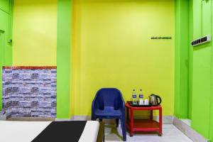 Posezení v ubytování Hotel O Raja Lodge + 34 fotografií