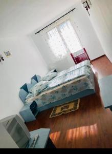 Postel nebo postele na pokoji v ubytování Pensiunea La Gheorghiță Fundata