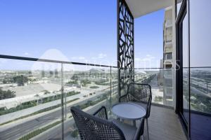 En balkon eller terrasse på Bloomfields Deluxe STU The Gate Masdar City
