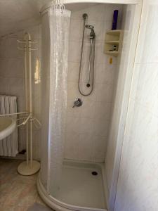 a shower in a bathroom with a tub and a sink at La Curt in Briosco +8 photos