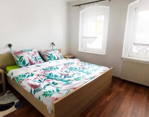 Una cama o camas en una habitación de Tysiąclecia 11/1