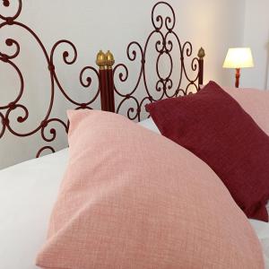 Postel nebo postele na pokoji v ubytování Repubblica Area Cagliari