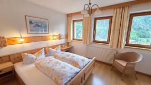 Postel nebo postele na pokoji v ubytování Apart Franziska + 39 fotografií