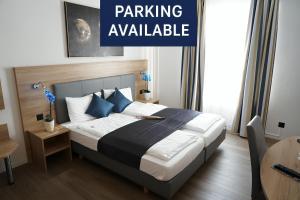 Ένα ή περισσότερα κρεβάτια σε δωμάτιο στο Centra Hotel Winterthur