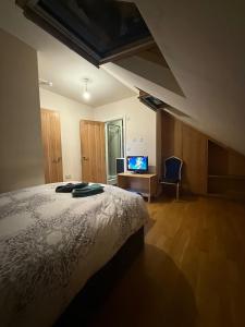 Ένα ή περισσότερα κρεβάτια σε δωμάτιο στο Tulse Hill