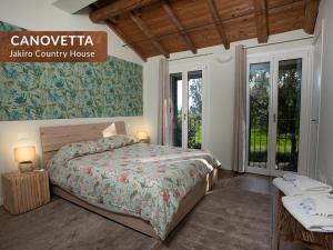 a bedroom with a bed and a sign that reads cancoonica echo country house at Canovetta Country Houses - nearby Cremona in Dosimo