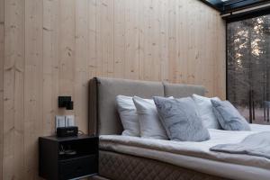 Voodi või voodid majutusasutuse Aurora Igloo Village Ylläs Luna Suite toas