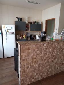 Η κουζίνα ή μικρή κουζίνα στο Casa independente com espaço gourmet