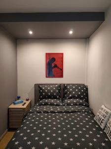 Ένα ή περισσότερα κρεβάτια σε δωμάτιο στο Giorgos studio Trikala