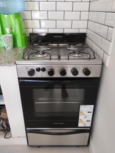 Kuchyň nebo kuchyňský kout v ubytování Ezeiza - Apartments Depto F - HASTA 6 PERSONAS