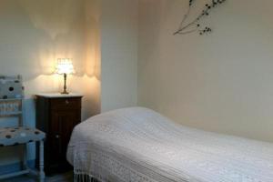 En eller flere senge i et værelse på La Reine des Prés