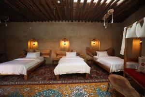 Postel nebo postele na pokoji v ubytování Beit Al Fateh بيت الفتح + 89 fotografií