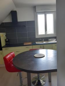 Η κουζίνα ή μικρή κουζίνα στο Logement Rieux À 6 Km De Redon +2 φωτογραφίες