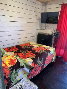 Ένα ή περισσότερα κρεβάτια σε δωμάτιο στο Los Diablos Hermanos