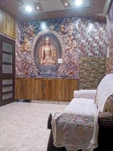 Ένα ή περισσότερα κρεβάτια σε δωμάτιο στο Jindal homestay