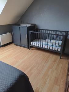 Ένα ή περισσότερα κρεβάτια σε δωμάτιο στο Logement Rieux À 6 Km De Redon