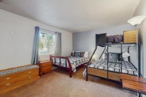 Postel nebo postele na pokoji v ubytování Apache Adventures