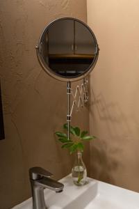 Φωτογραφία από το άλμπουμ του 国立公園の山裾で自然にポツン 草本 σε Tatsugo