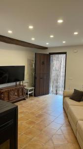 Телевизор и/или развлекательный центр в Casa Felipa