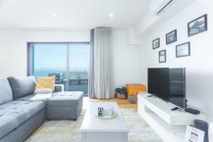 Μια τηλεόραση ή/και κέντρο ψυχαγωγίας στο Villa das Escaleiras with Pool and Jacuzzy