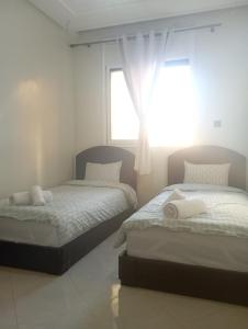 Ένα ή περισσότερα κρεβάτια σε δωμάτιο στο MARIA HOUSE