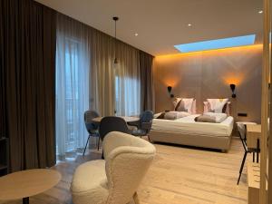 Ένα ή περισσότερα κρεβάτια σε δωμάτιο στο Hotel Lotus