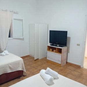 TV a/nebo společenská místnost v ubytování Casa Mar Azul Arinaga