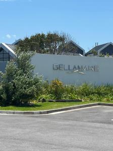 a sign for the blm entrance on the side of a building at Flat 4 Block 12 Bellamare in Port Elizabeth