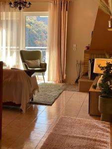 Posezení v ubytování Arcadian Escape - Tsiaxtai Group