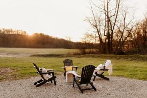 a group of chairs sitting on top of a field at The Pinnacle in Logan