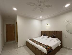 Voodi või voodid majutusasutuse Hotel Crescent toas