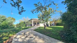 A garden outside Secret de campagne Spa