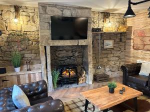 Et tv og/eller underholdning på Fishermans Cottage