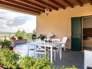 En balkon eller terrasse på La Vedetta Country Rooms