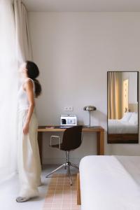 Postel nebo postele na pokoji v ubytování Outsite Barcelona