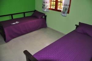 Postel nebo postele na pokoji v ubytování Complejo Carola