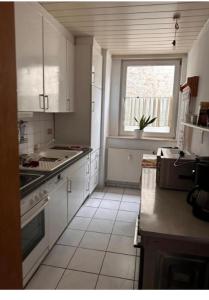 Η κουζίνα ή μικρή κουζίνα στο Brakel Monteu -Ferin Wohnung 1-5xDouble Zimmer