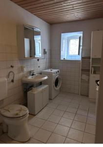 Ένα μπάνιο στο Brakel Monteu -Ferin Wohnung 1-5xDouble Zimmer