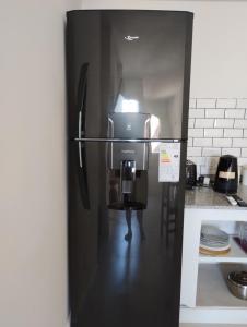 Η κουζίνα ή μικρή κουζίνα στο Ezeiza - Apartments Maradona -A-PB