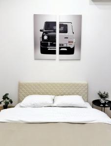 Ένα ή περισσότερα κρεβάτια σε δωμάτιο στο Kyiv Gelik Apartment