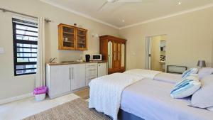 Η κουζίνα ή μικρή κουζίνα στο 7 Wilde Olyf Street