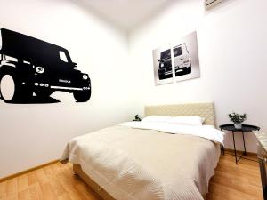 Ένα ή περισσότερα κρεβάτια σε δωμάτιο στο Kyiv Gelik Apartment