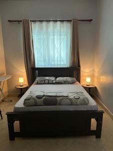 Ένα ή περισσότερα κρεβάτια σε δωμάτιο στο Aurora one